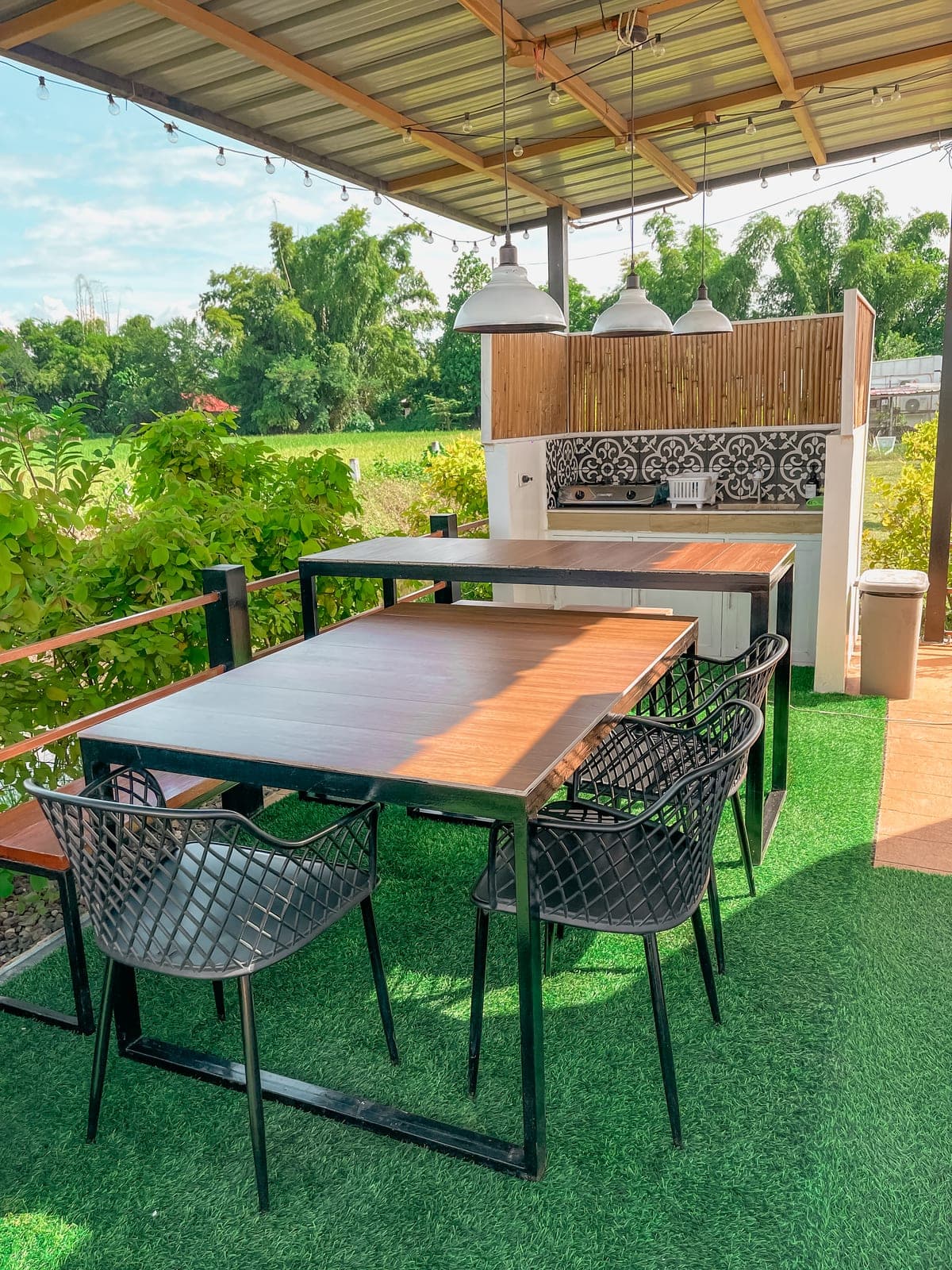 The outdoor dining area with several tables set out