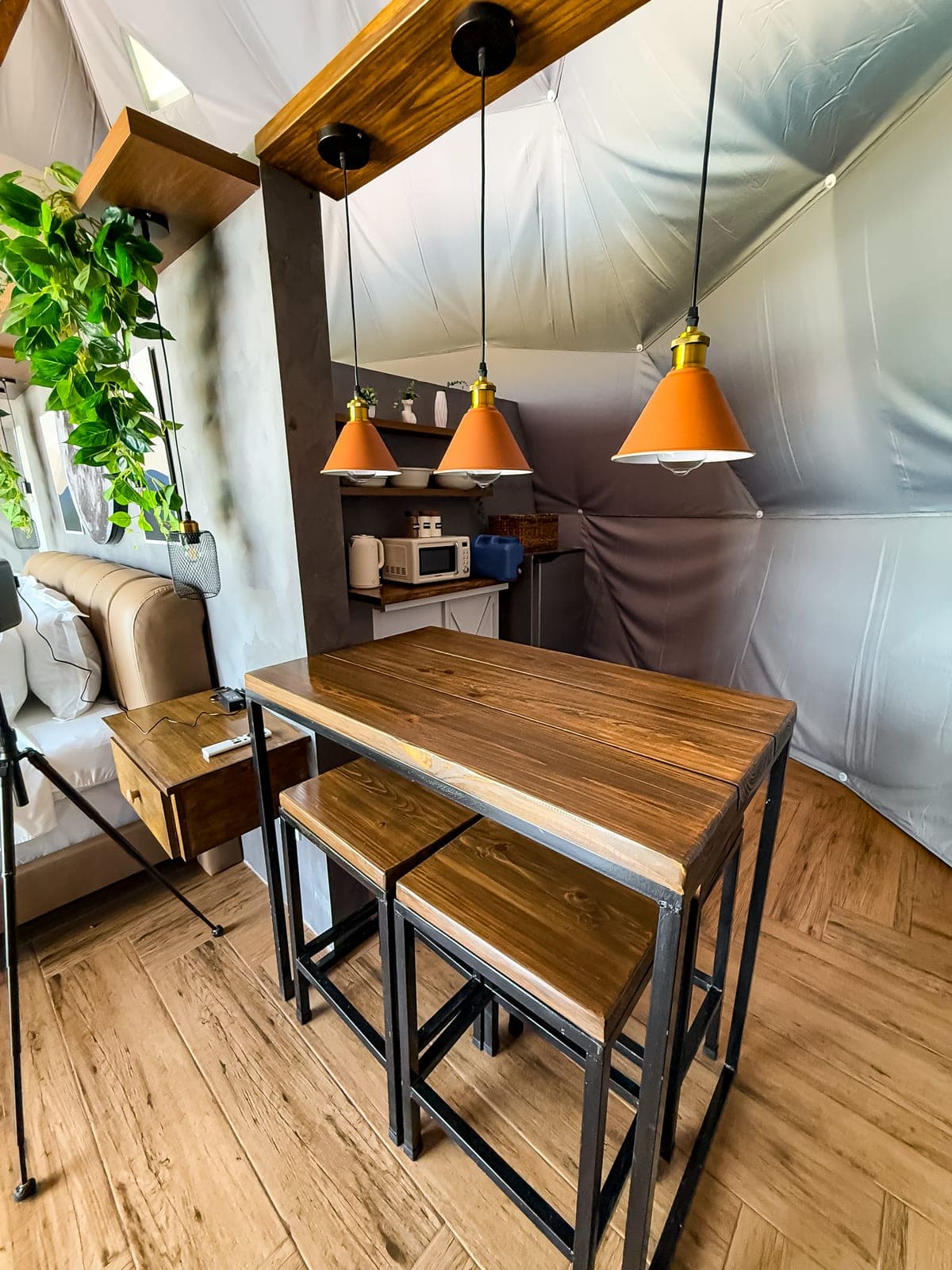 Dome 2: the wooden bench and bar table by the kitchenette